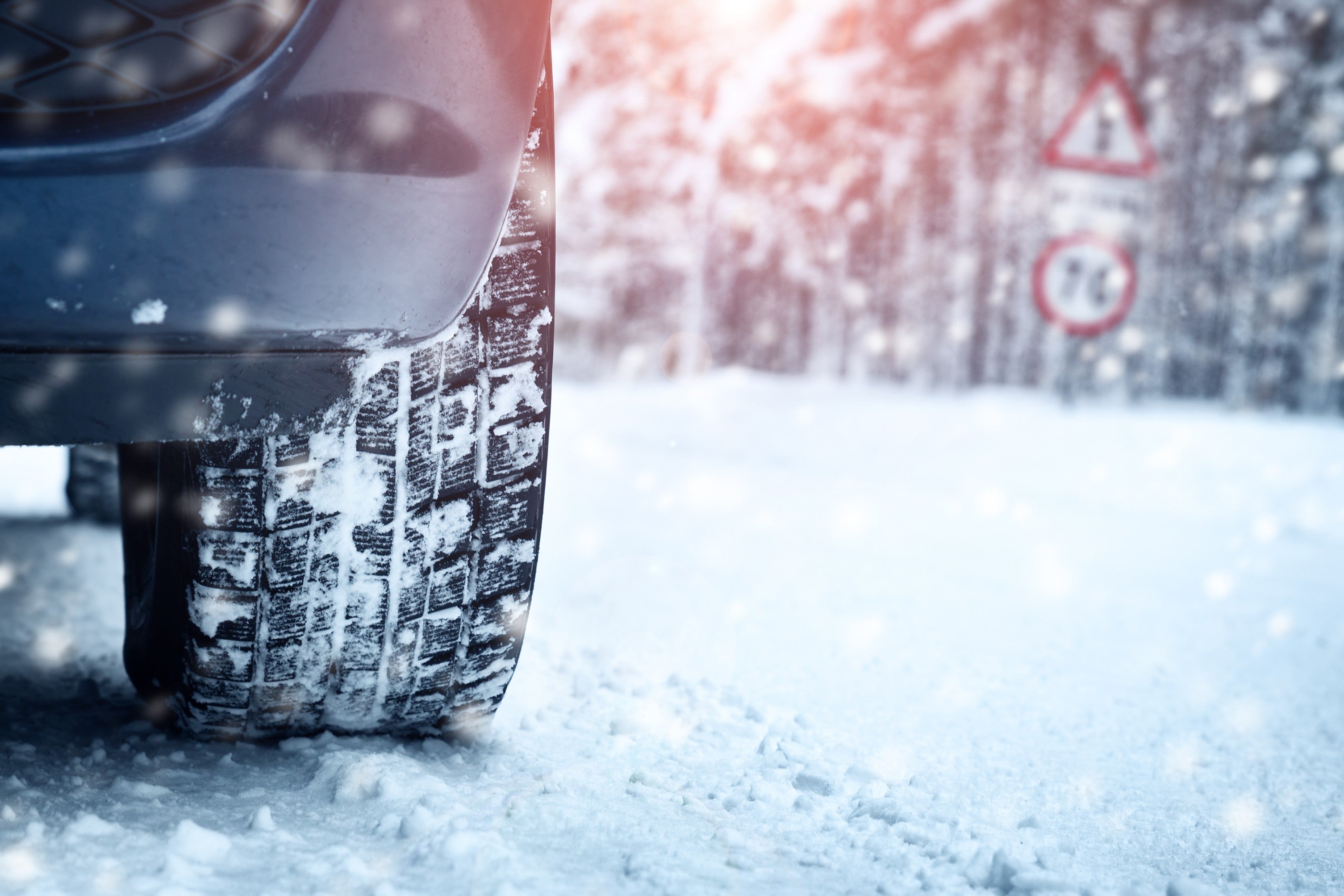Snowy road driving with winter tire